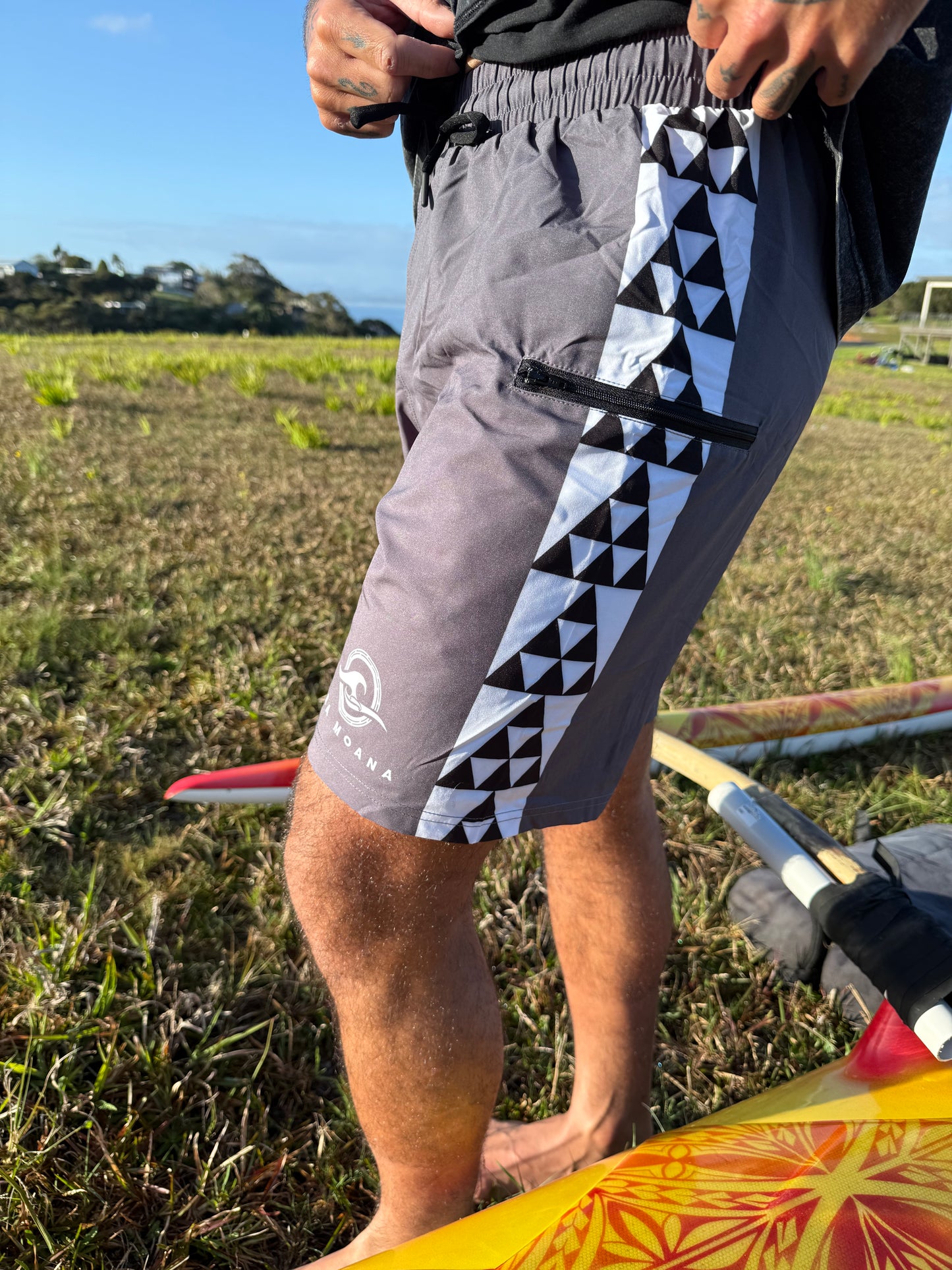 TARAU POTO NIHO TANIWHA - PATTERNED BOARD SHORTS
